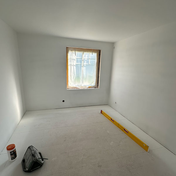 Ytskikt spackling och målning